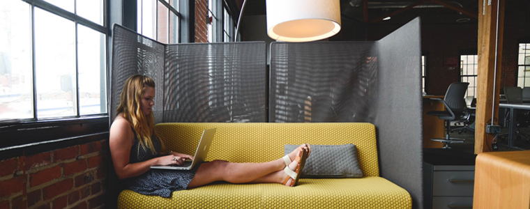 woman-working-on-couch